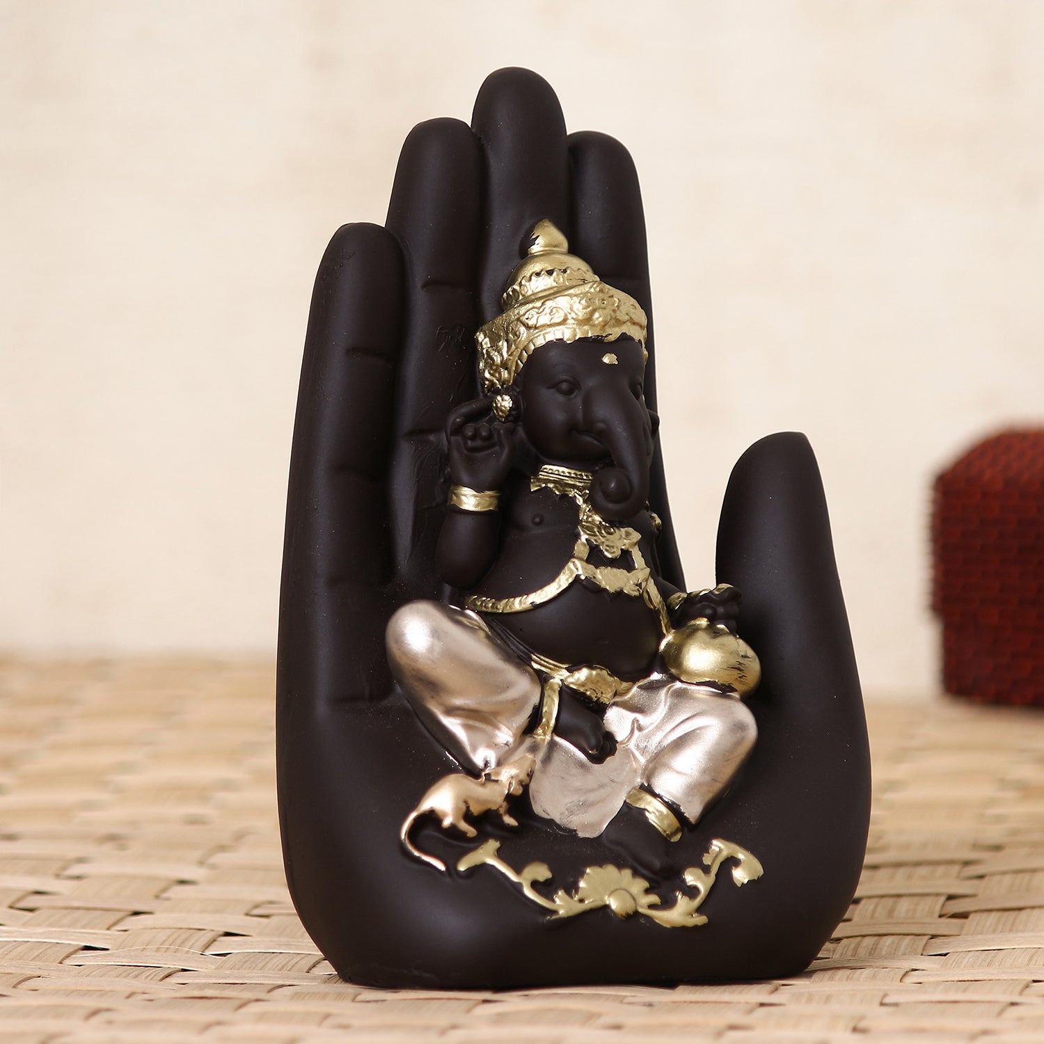 Black and Golden Handcrafted Polyresin Palm Ganesha Ji Idol